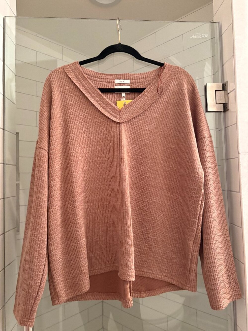 Cozy top, color is a bit deeper than shows and really pretty. NWT